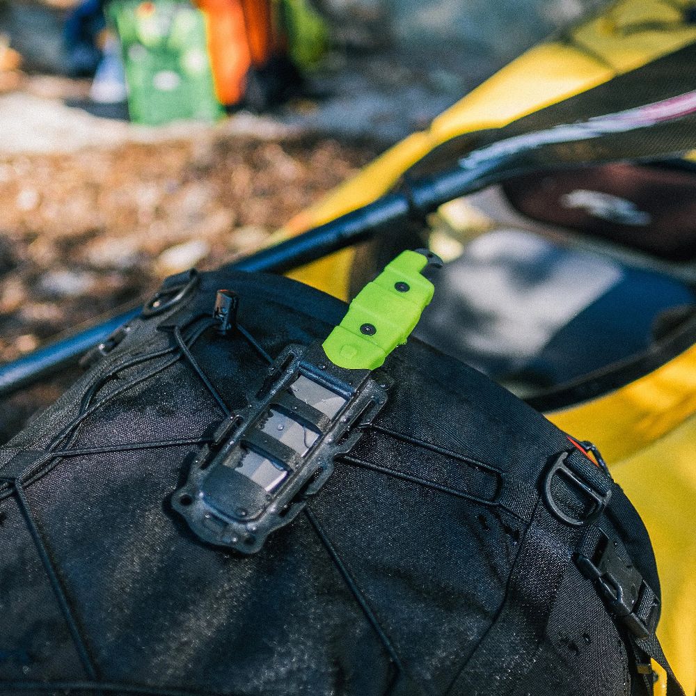 Gear Aid Akua River Knife green in sheath on backpack
