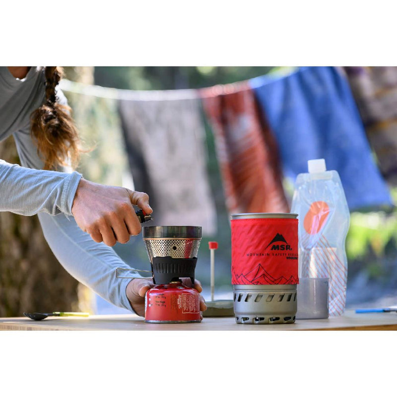 MSR WindBurner Personal Stove System black being lit