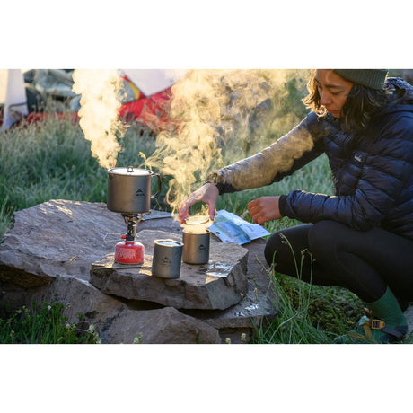 MSR Titan Double Wall Mug with camping pot and stove