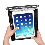 Fidlock Hermetic Dry Bag Mega with tablet in hand
