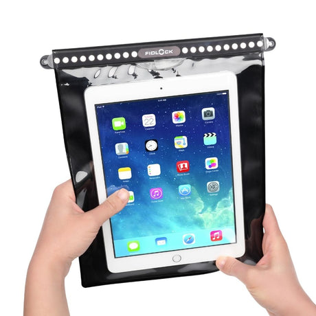 Fidlock Hermetic Dry Bag Mega with tablet in hand