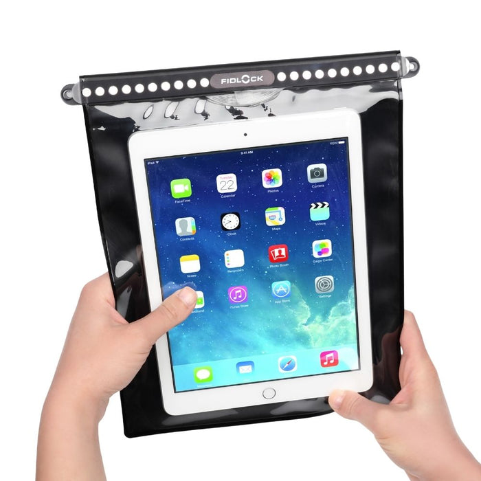 Fidlock Hermetic Dry Bag Mega with tablet in hand