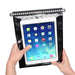 Fidlock Hermetic Dry Bag Mega with tablet in hand