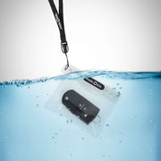 Fidlock Waterproof Dry Case Mini with key submerged in water