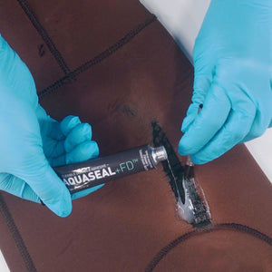 Gear Aid Aquasure +FD™ Flexible Durable Repair Adhesive repairing wetsuit tear